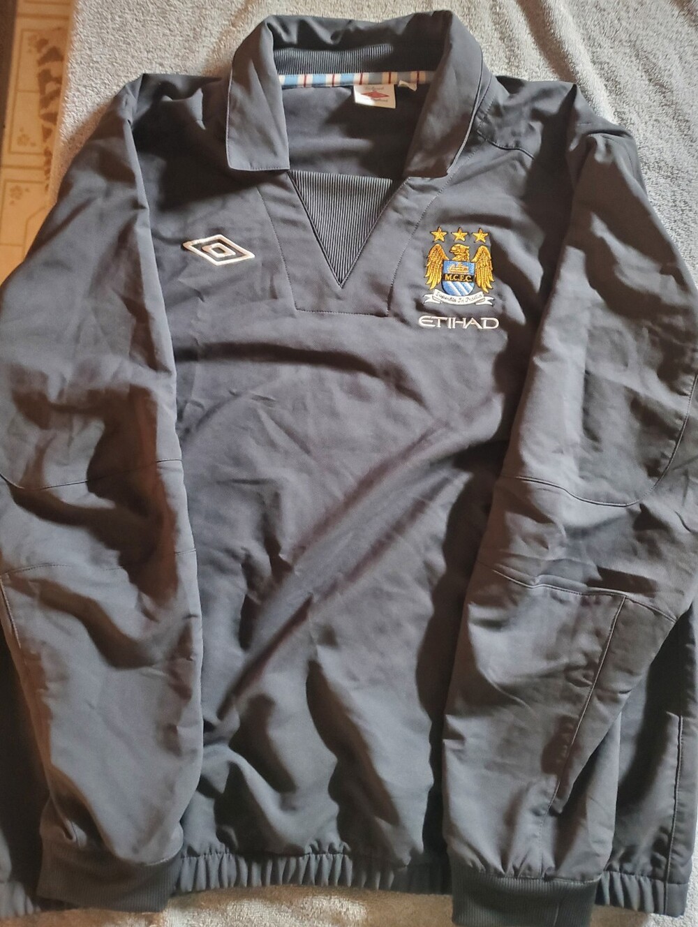 Manchester City Umbro Jacket with Logo Accent